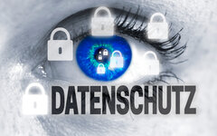 datenschutz (in german data protection) eye looks at viewer concept